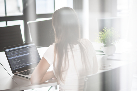 Developing programming and coding technologies. Website design. Programmer working in a software develop company office.の写真素材
