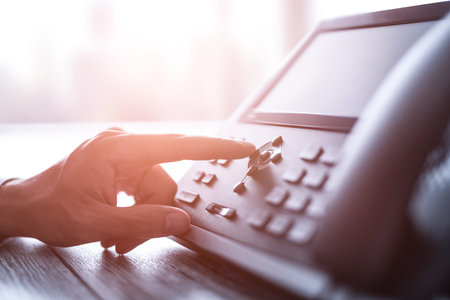 Communication support, call center and customer service help desk. Using a telephone keypad.