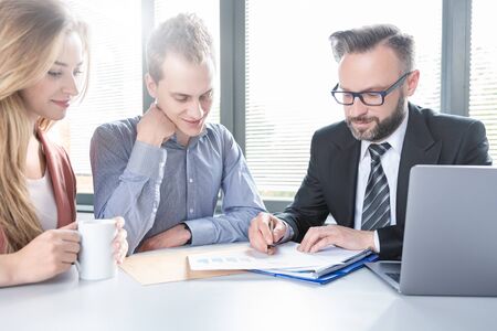 Family couple consultations with a lawyer or insurance agent. Law and insurance.の写真素材
