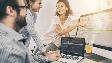 Developing programming and coding technologies. Website design. Programmer working in a software develop company office.の写真素材