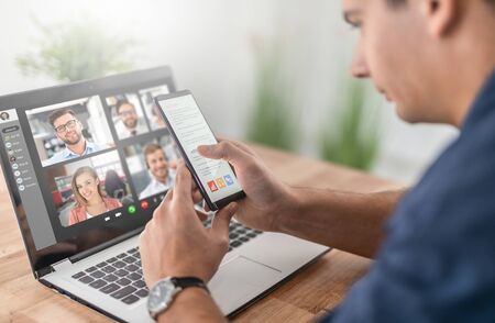 Virtual talking with friends, colleague and using video chat conference. Remote learning or work. Home quarantine or prevention of coronavirus infection (virus covid-19). Group of people smart workingの写真素材
