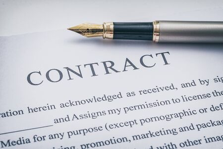 Business contract and pen on the desk. Business and finance concept.の写真素材