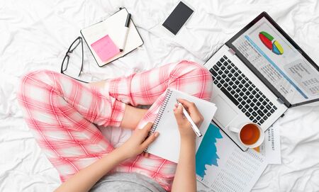 Working home concept. Young people online work mobile devices. Social media influencer.の写真素材