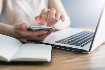 Working home concept. Young people online work mobile devices. Social media influencer.の写真素材