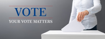 The voter holds his vote ballot paper and places it in the ballot box. Filling in ballots and...