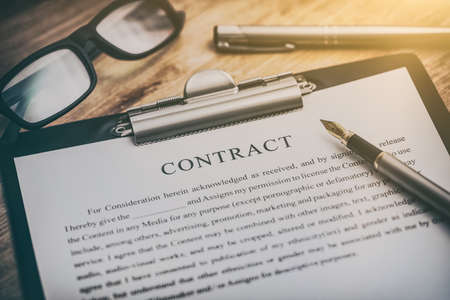 Business contract and pen on the desk. Business and finance concept.の写真素材