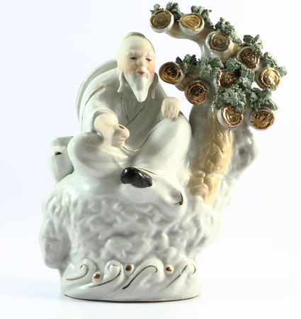 chinese porcelain
figurines closed up on white backgroundの写真素材