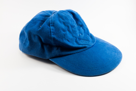 Crumpled blue cap isolated on white background closeupの写真素材