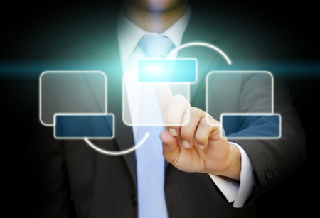 Businessman using digital interface with his fingers