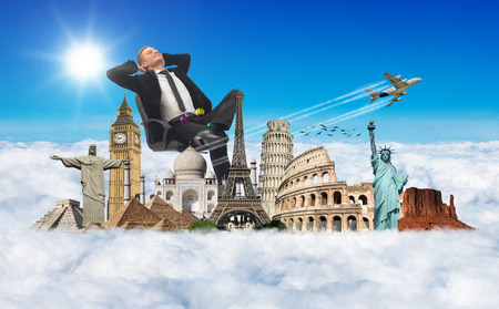 Businessman sleeping in a cloud dreaming about his holidaysのeditorial素材
