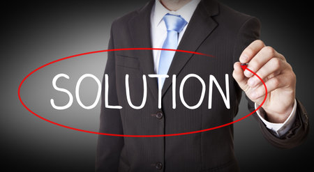 Businessman touching digital interface illustrating solution concept