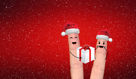 A happy couple in love offering gifts to each otherの写真素材