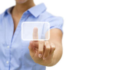 Businesswoman using digital interface with her fingersの写真素材