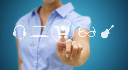 Woman using digital interface to shop onlineの写真素材