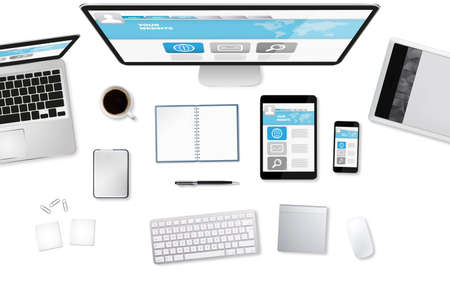 Workplace with tablet computer and mobile phone on tableの写真素材