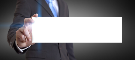 Businessman holding white business card in his handの写真素材