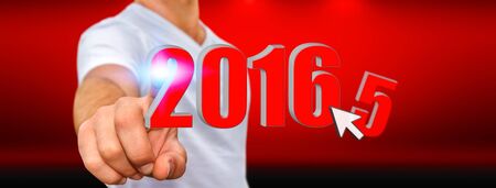 Man holding 2016 icons for the new yearの写真素材