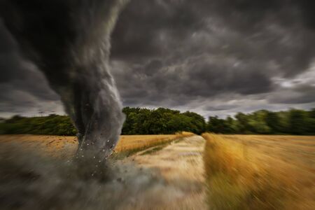 View of a large tornado destroying the landscapeの写真素材