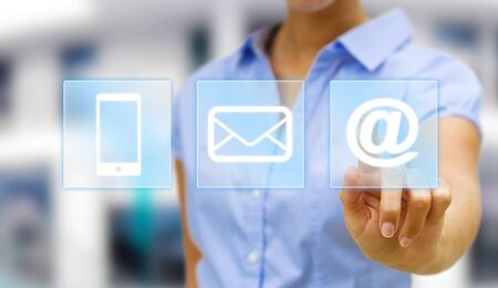 Businesswoman in his office using digital interfaceの写真素材