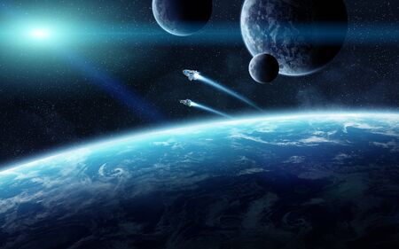 View of a sunrise on a distant planet system in spaceの写真素材