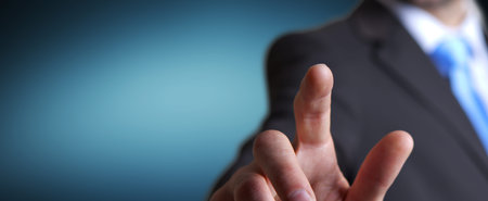 Young man giving empty hand on colorful background