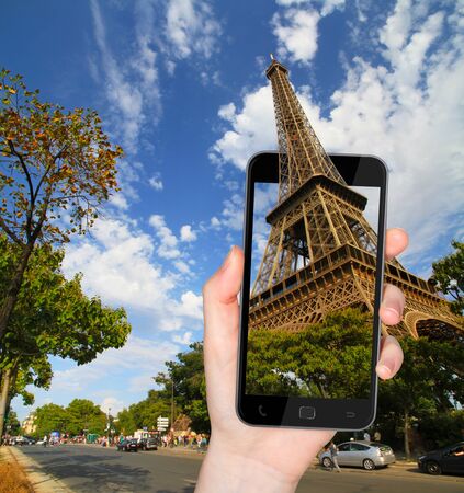 The Eiffel Tower in Paris during sunny day taken with a modern mobile phoneの写真素材