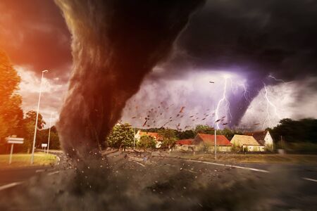 View of a large tornado destroying an entire cityの写真素材