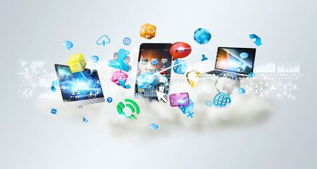 Cloud connecting tech devices and icons applications with each otherの写真素材