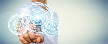 Businessman in his office pushing digital tactile circle technology screens