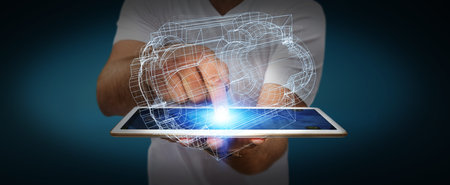 Businessman with 3D engine plan over his mobile phone
