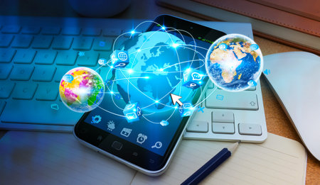 Blue world over modern mobile phone in office