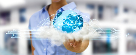 World over a cloud connected to businesswoman fingers