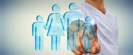 Businessman holding family icon in his handの写真素材