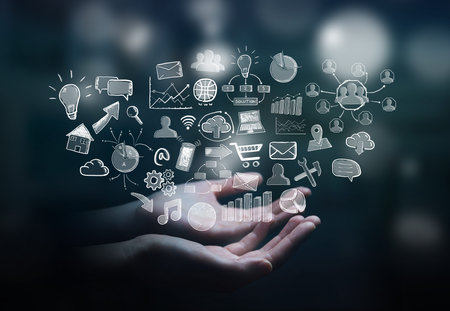 Businesswoman holding hand drawn web icons in her hand