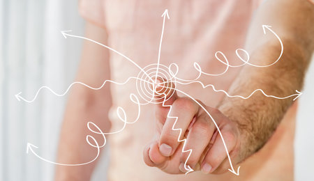 Man touching hand-drawn business presentation iwith his finger on blurred background