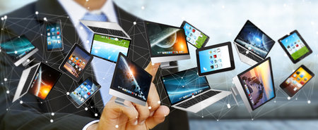 Businessman on blurred background connecting tech devices ‘3D rendering’