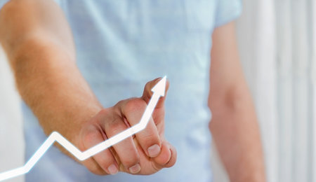 Businessman touching digital arrow with his finger ‘3D rendering’