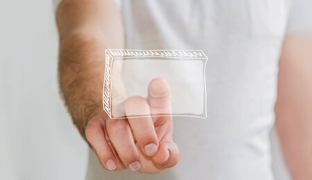 Man touching hand-drawn business presentation iwith his finger on blurred backgroundの写真素材