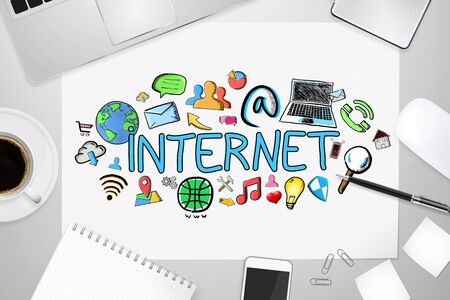 Hand drawn internet presentation with icons on office backgroundの写真素材