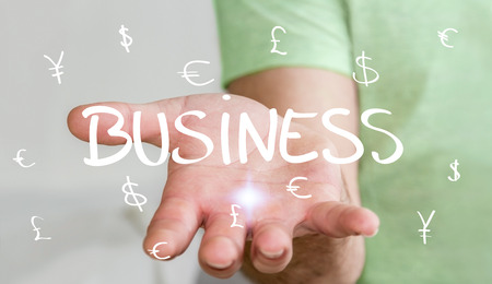 Man holding hand-drawn business presentation in his hand on blurred backgroundの写真素材