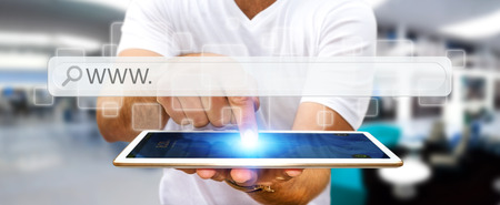 Man using tactile interface web address bar to surf on internetの写真素材