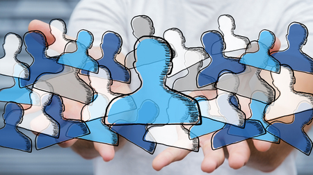 Businessman on blurred background holding hand drawn social network in his handの写真素材