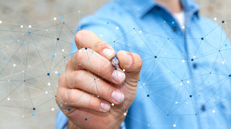 Businessman on blurred background using digital data network with a pen