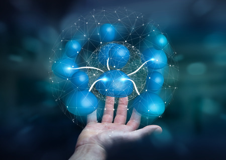 Businessman holding blue icon social network in his hand 3D renderingの写真素材