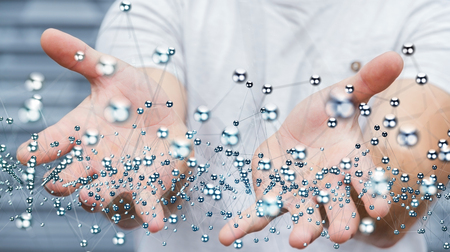 Businessman holding abstract connection interface with lines and dots 3D renderingの写真素材