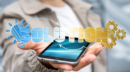 Businessman holding hand-drawn business presentation over his mobile phoneの写真素材
