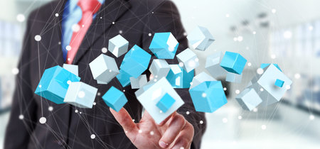 Businessman on blurred background touching flying blue shiny cube 3D rendering