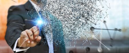 Businessman on blurred background touching 3D rendering data network sphere with his fingersの写真素材