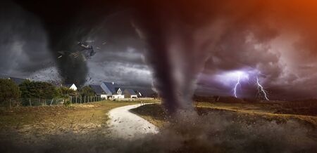 View of a large tornados destroying the landscape and cityの写真素材