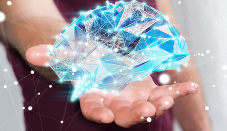 Businessman holding digital human brain with cell and neurons activity 3D rendering